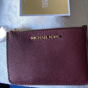 Maroon Michael Kors credit card holder